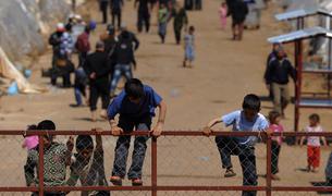 Заниматься возвратом беженцев в Сирию без сотрудничества с Асадом неправильно - Чавушоглу