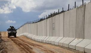 Турция завершит возведение стены на границе с Сирией к весне 2018 года